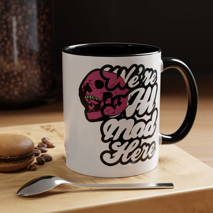 Taza de café "Todos estamos locos aquí" (11, 15 oz)